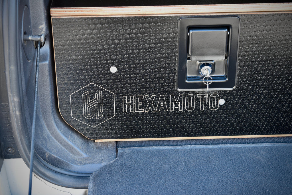 Hexamoto branded compartment in a vehicle