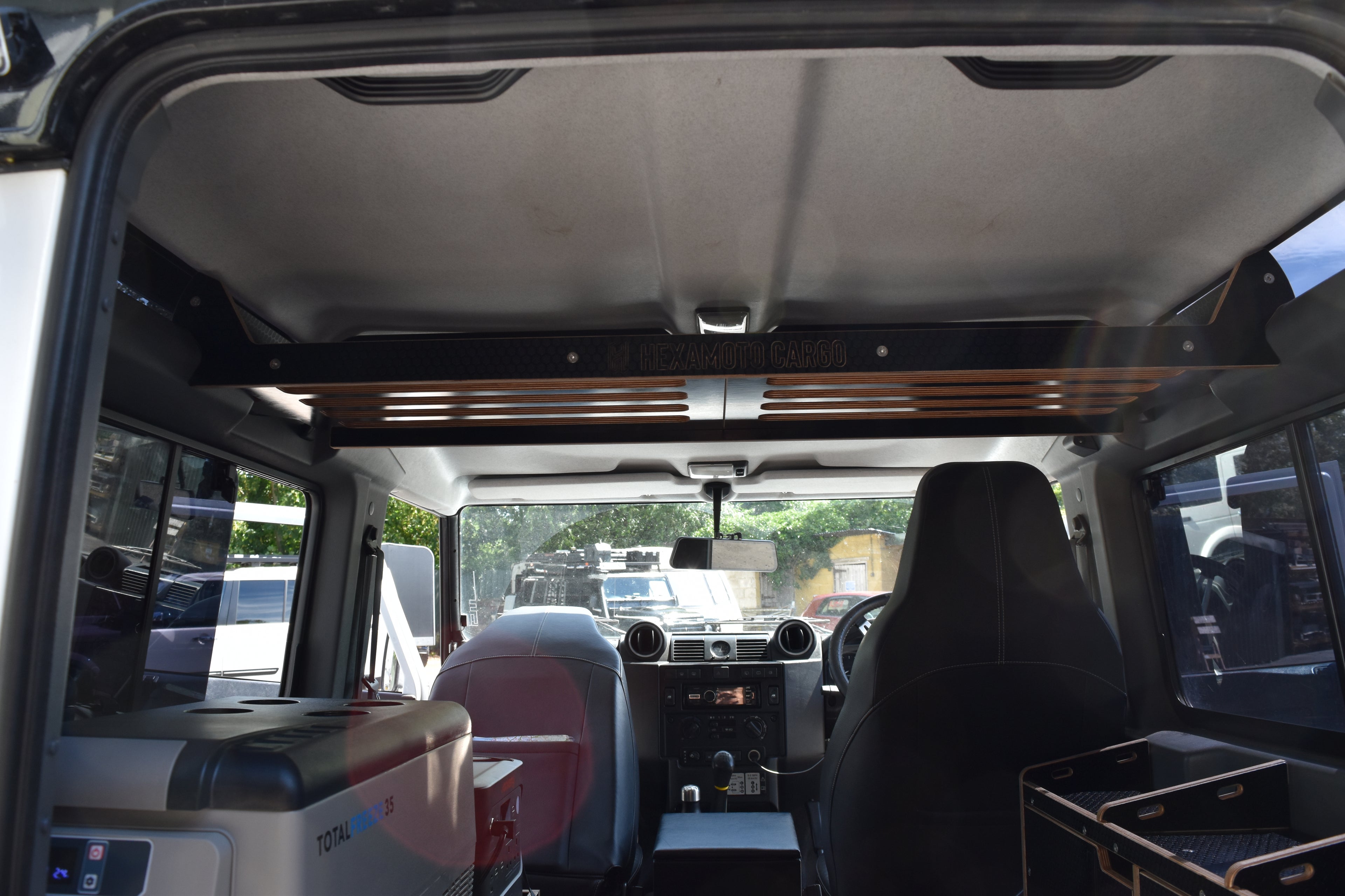 DEFENDER 90 CARGO SHELF SYSTEM