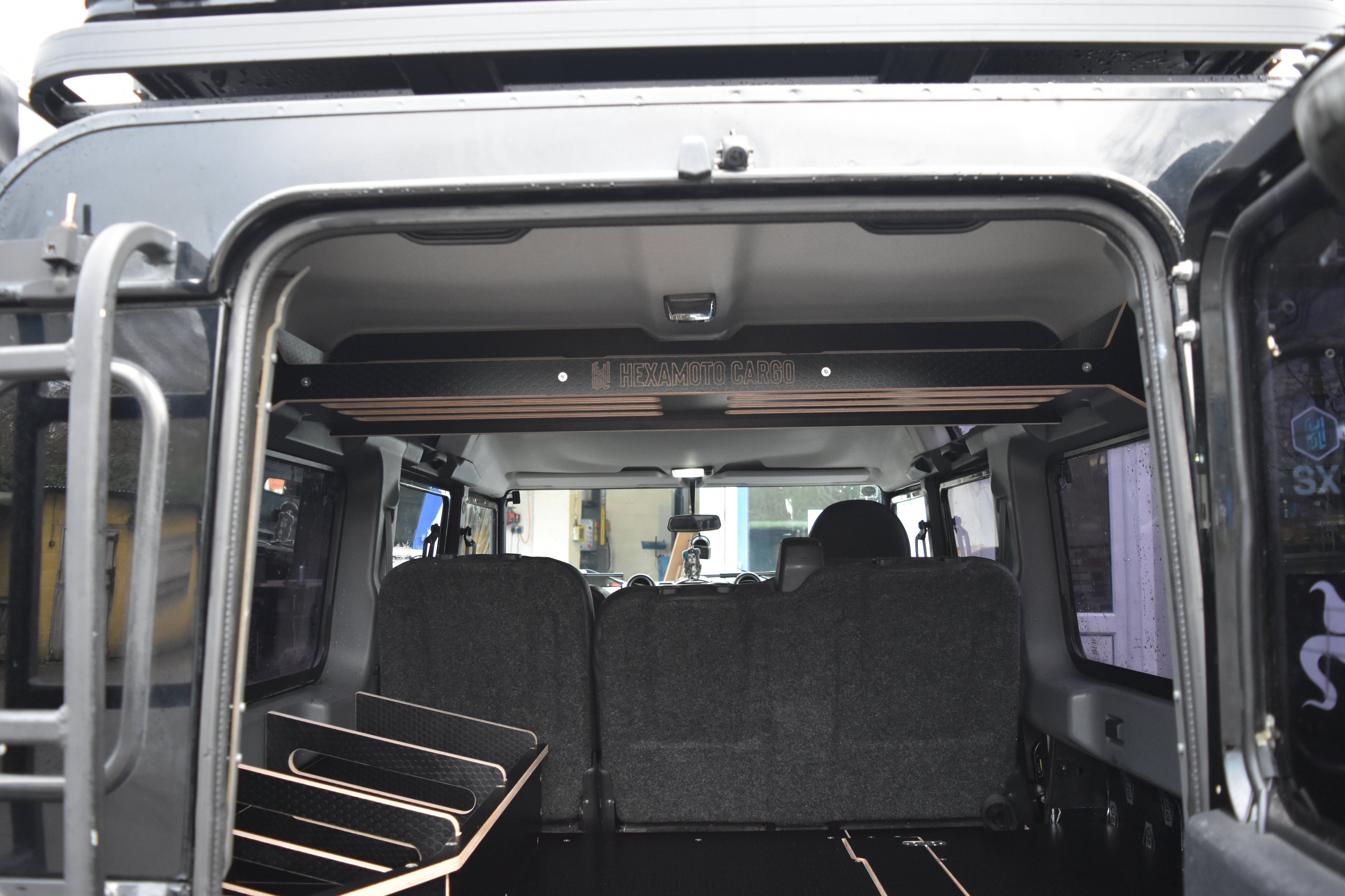 Back of a Defender 110 with Hexamoto items fitted