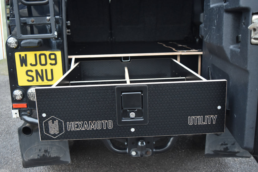 Hexamoto Utility storage drawer attached to a vehicle with drawer open