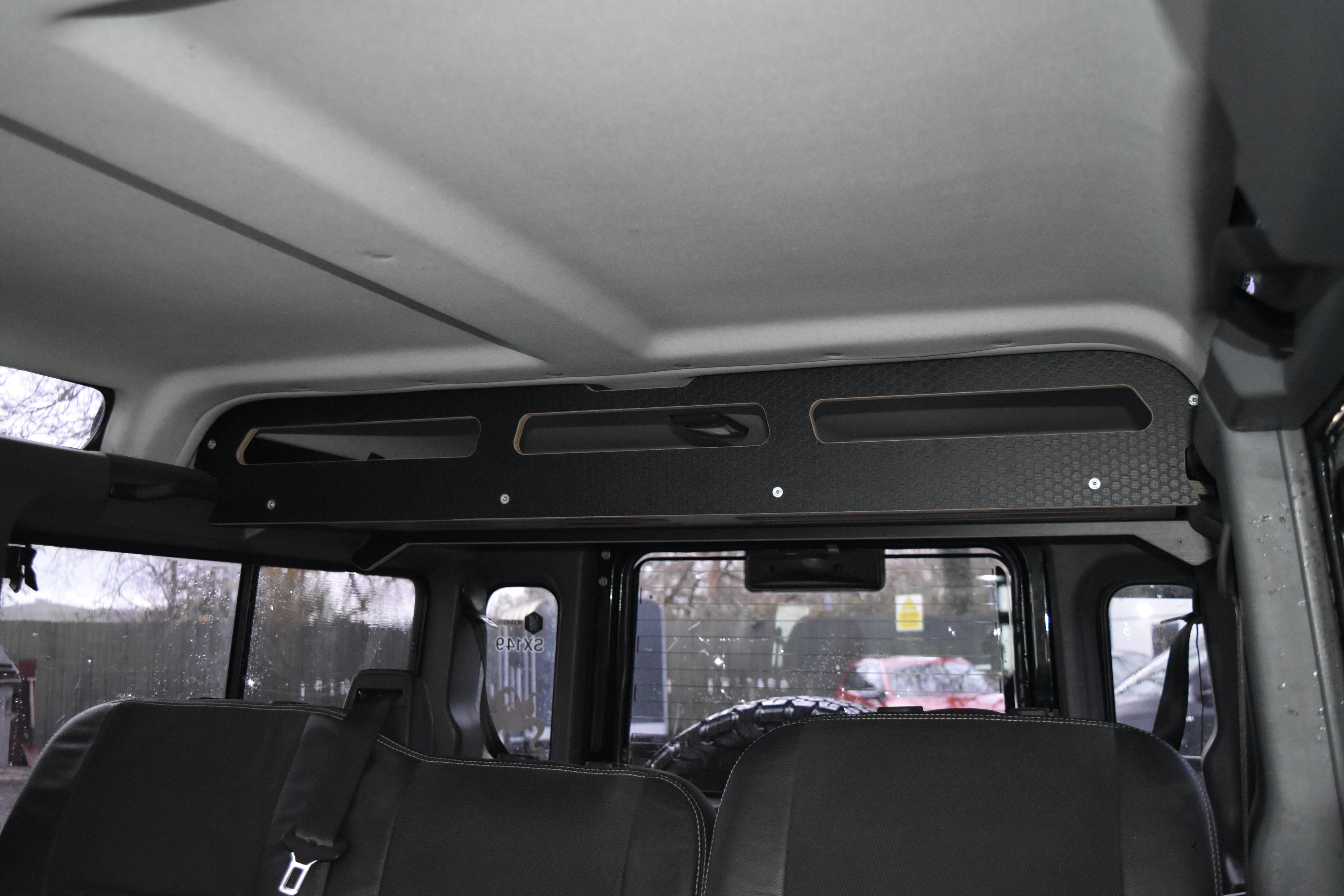 Car interior with a roof Cargo storage system