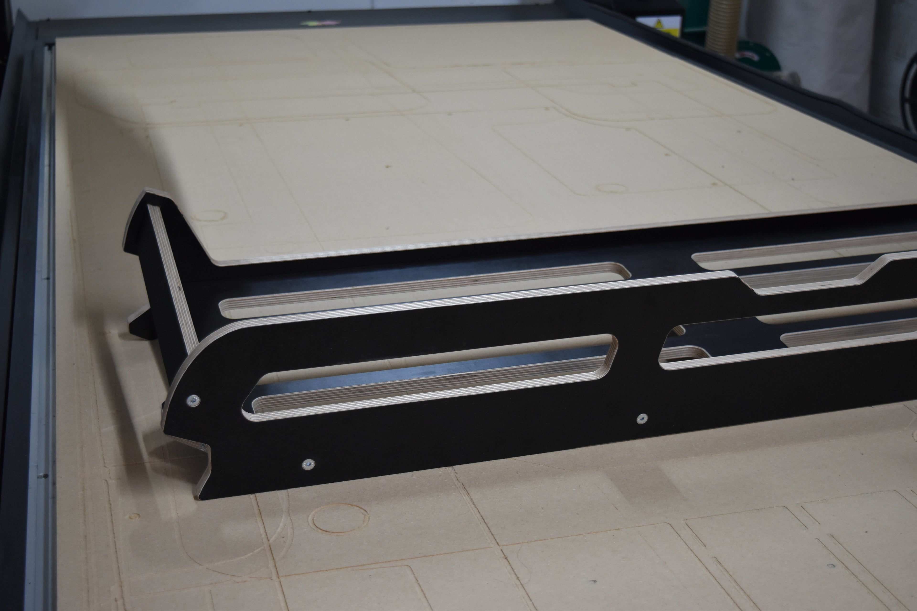 Wooden Cargo System for Defender sat on CNC bed, fully assembled