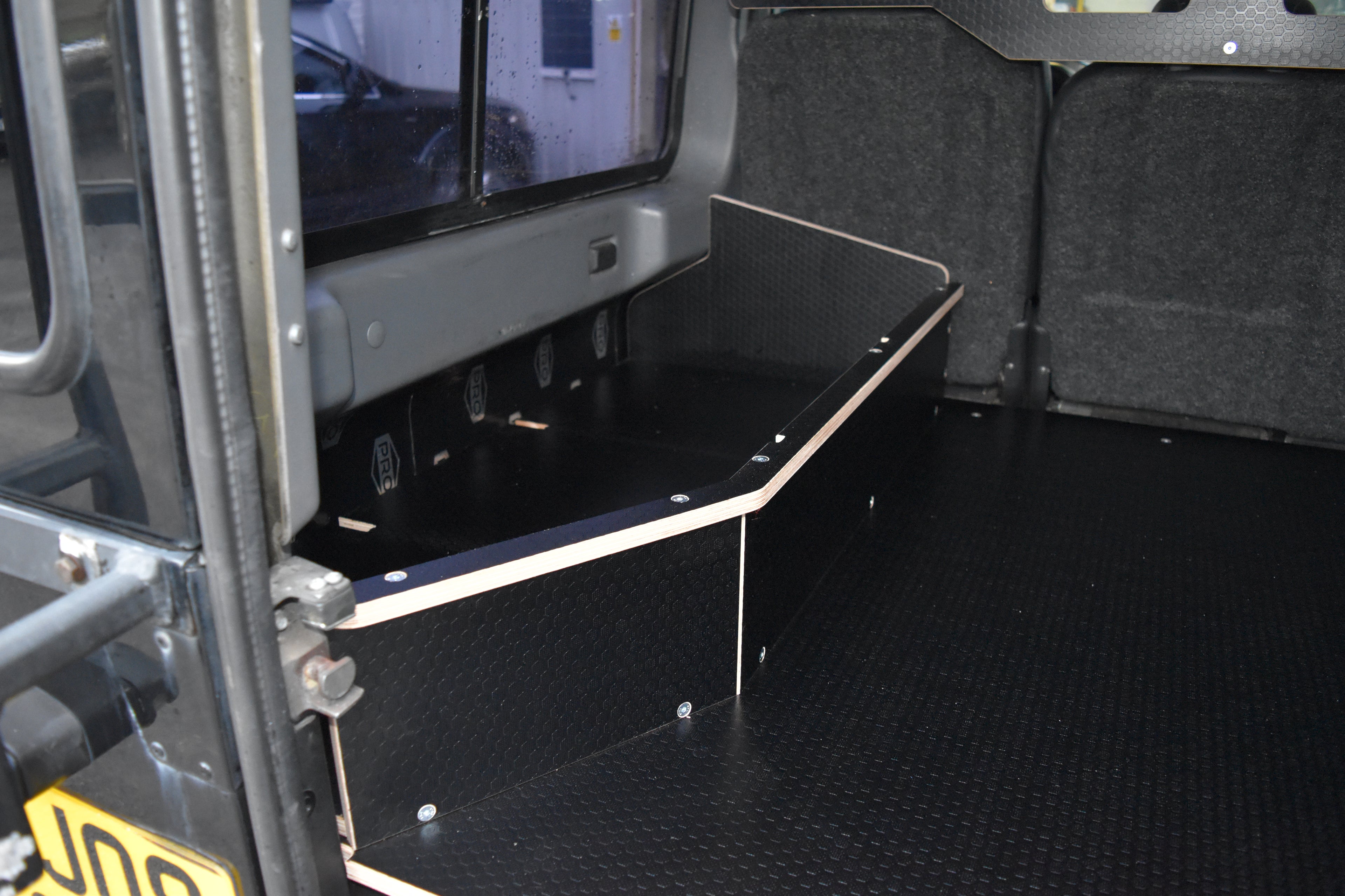 Hexamoto Defender 110 With Utility Storage Basket with dividers removed