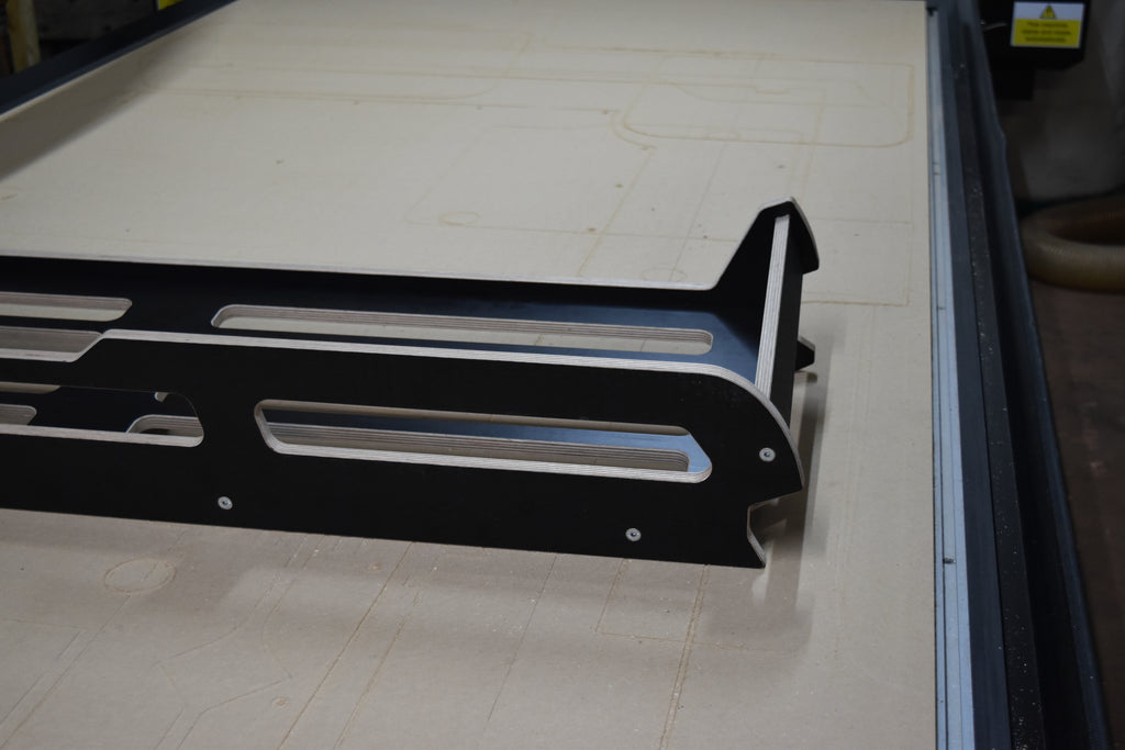 Hexamoto Defender Cargo System on CNC bed, showing one side