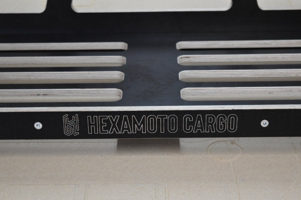 Hexamoto Cargo logo on Defender Cargo 