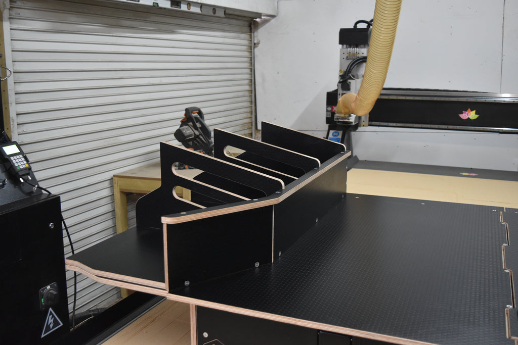CNC machined storage basket system with removable dividers for Land Rover Defender. 