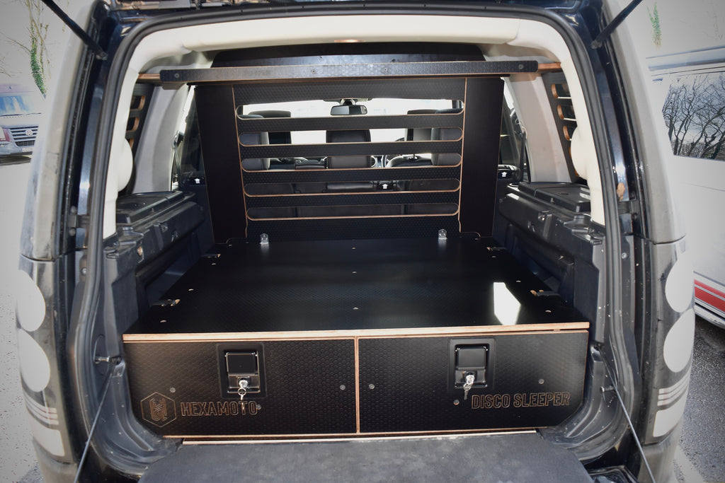 Open truck boot with storage shelves and a drawer system fitted