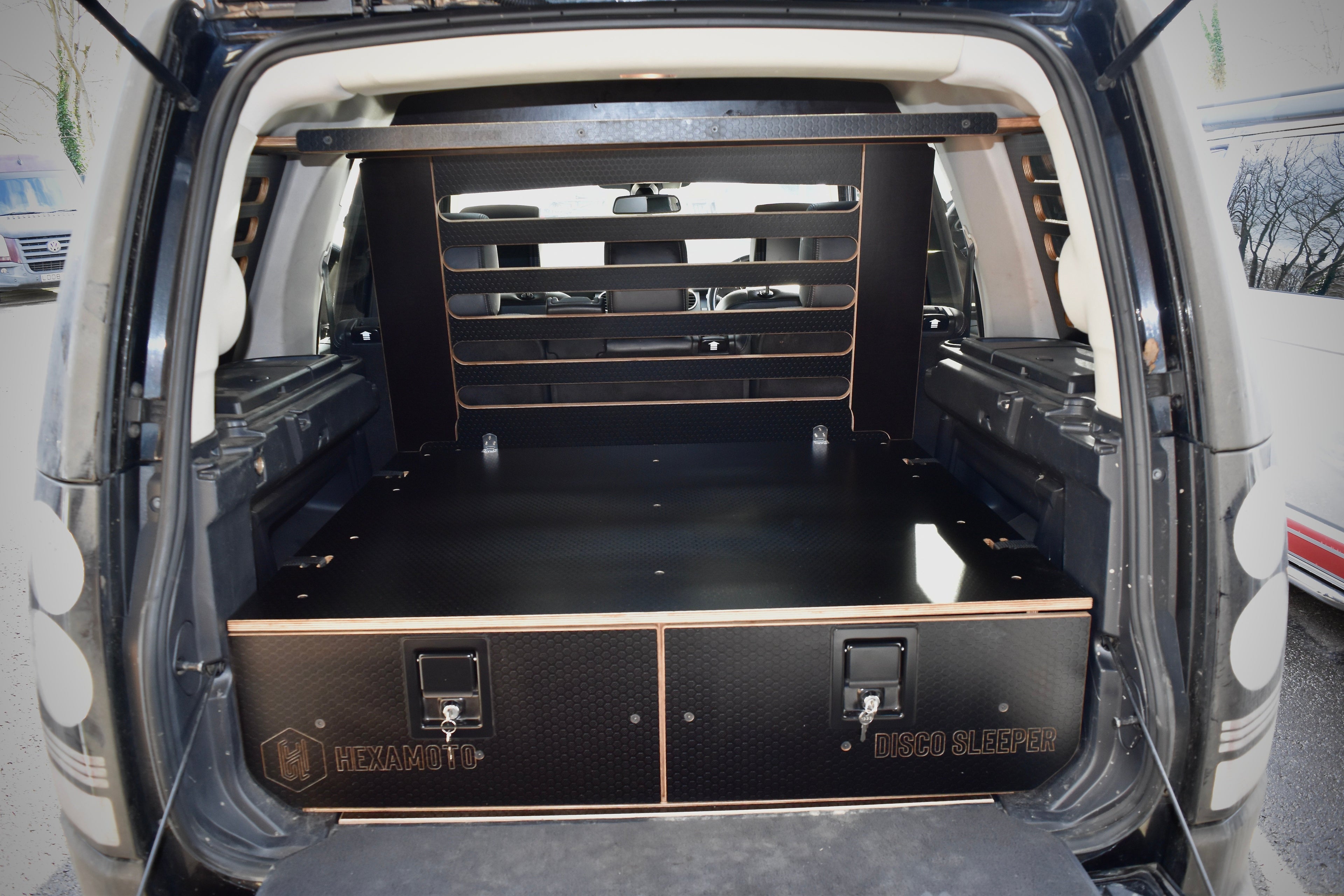 Open truck boot with storage shelves and a drawer system fitted