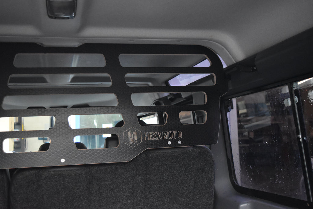 Land Rover Defender Dog Guard fitted in a Defender