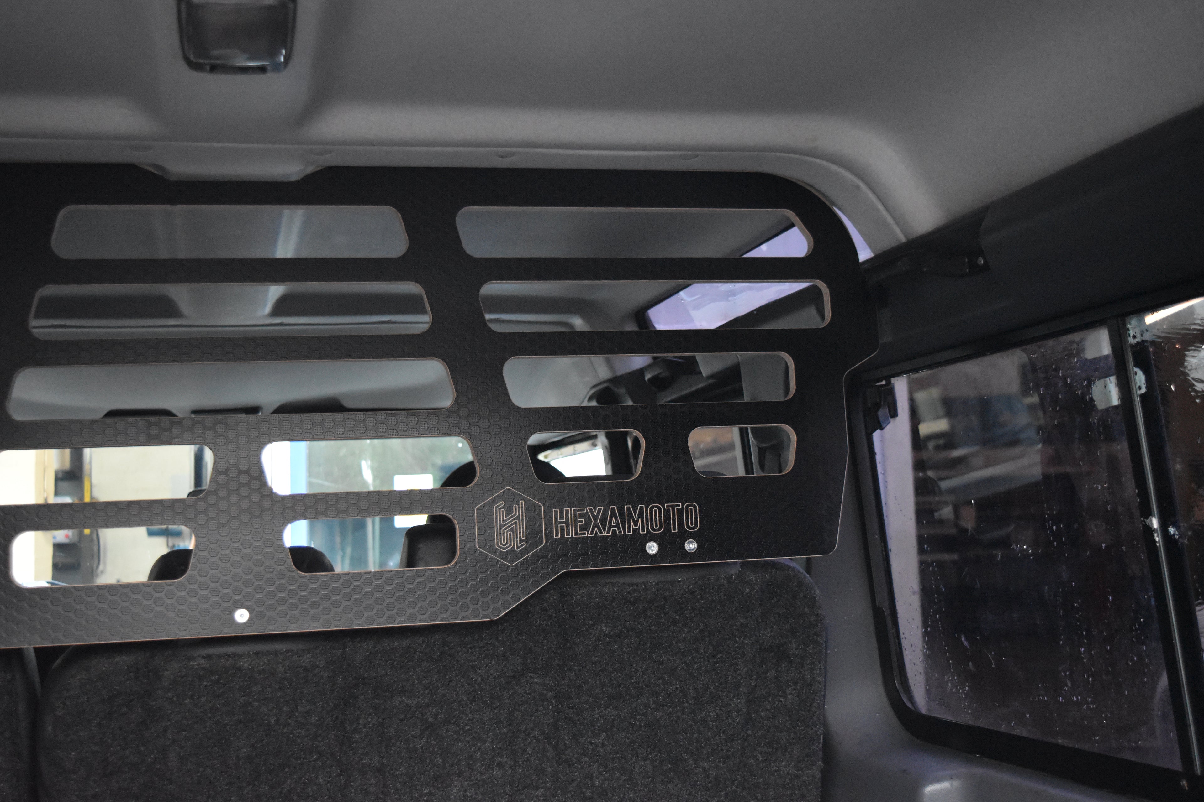 Land Rover Defender Dog Guard fitted in a Defender