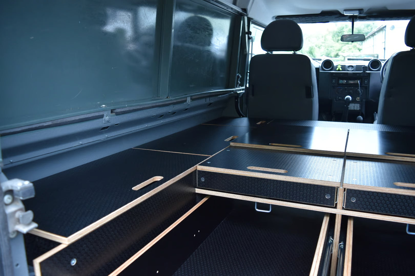 Defender interior with drawer and storage system fitted