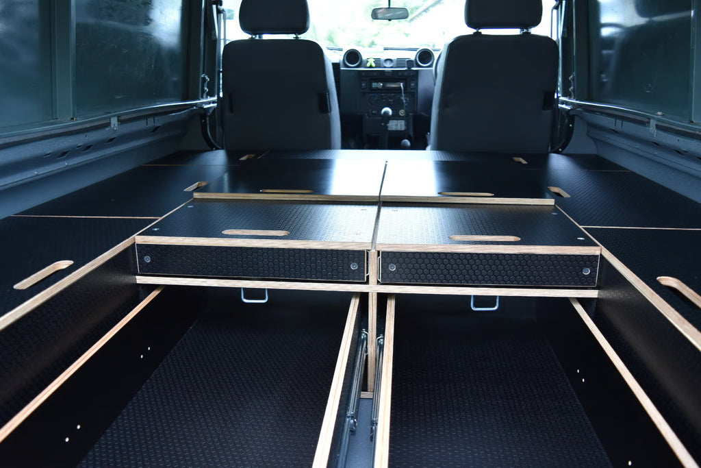 Defender interior with Easy Sleeper Storage System and sleep platform 
