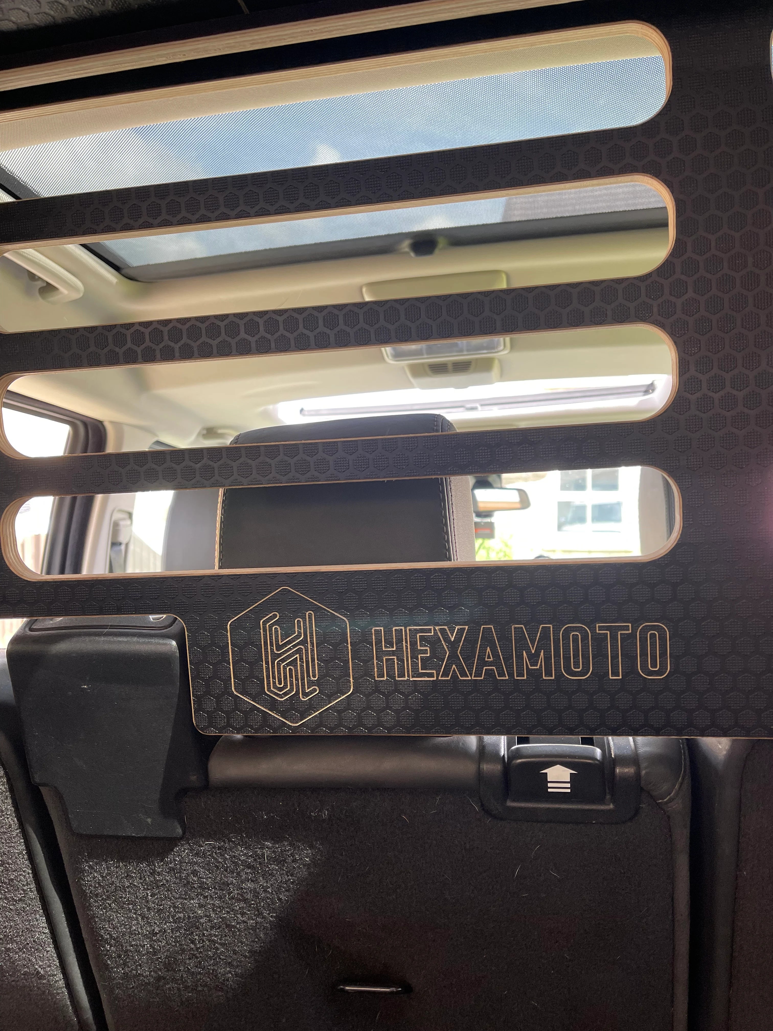 Hexamoto product with textured surface and logo