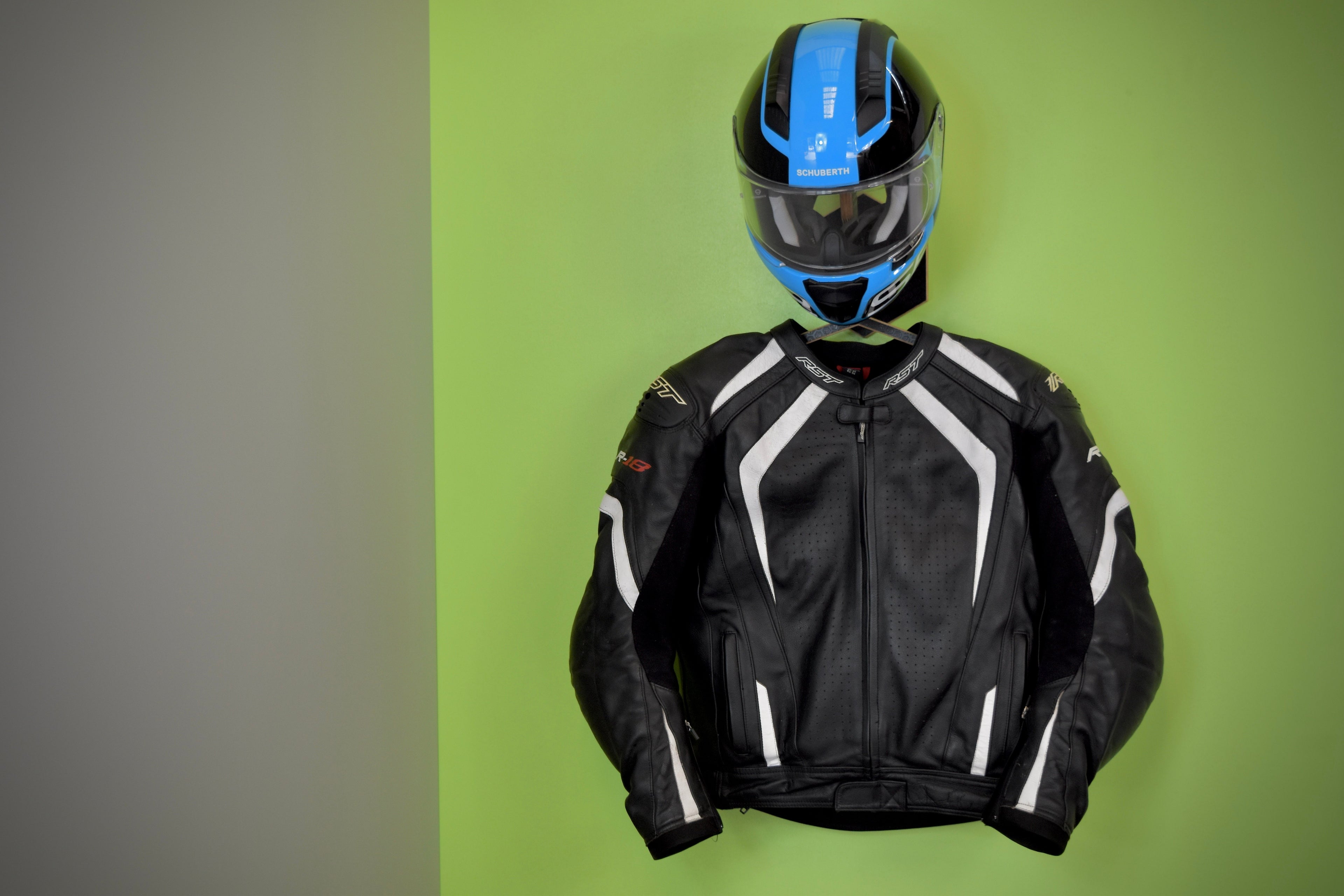 Hexamoto Mini with helmet and leather jacket hanging from it