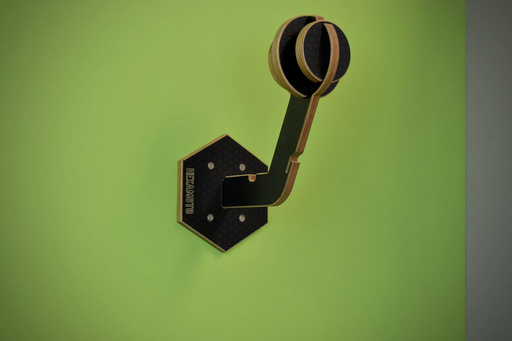 Wooden branded wall hook for motorcycle clothing