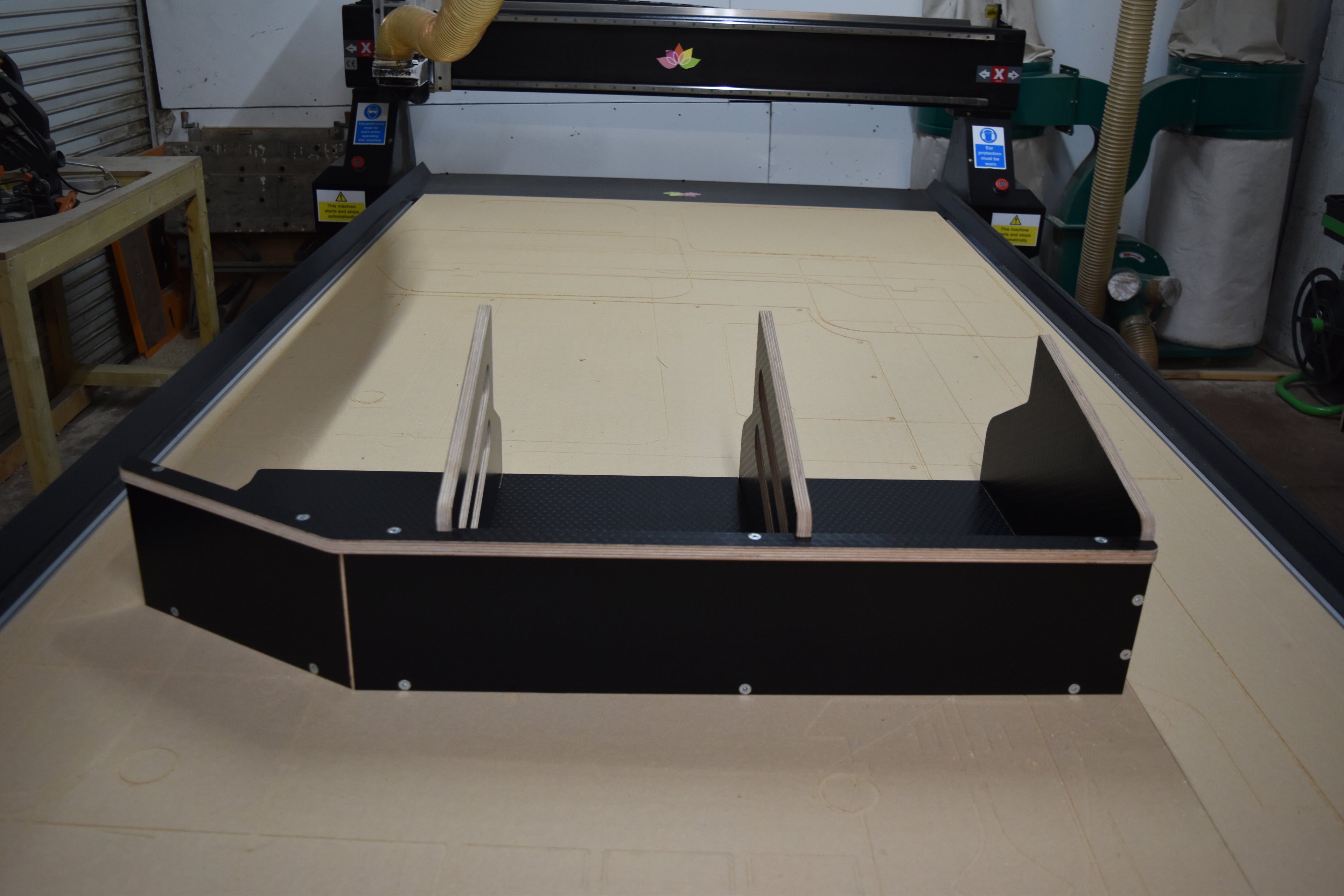 The Hexamoto Storage Basket sat on top of a CNC, fully assembled