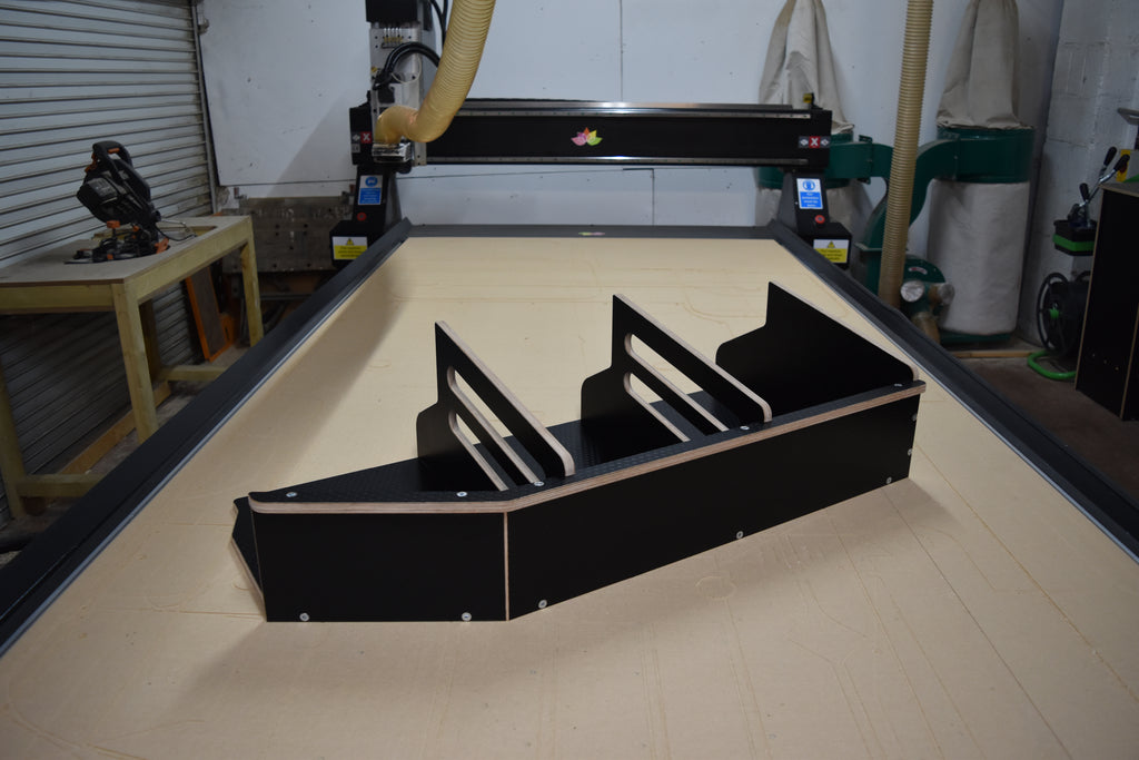 The Hexamoto Utility Basket fully assembled and laid on a CNC machine