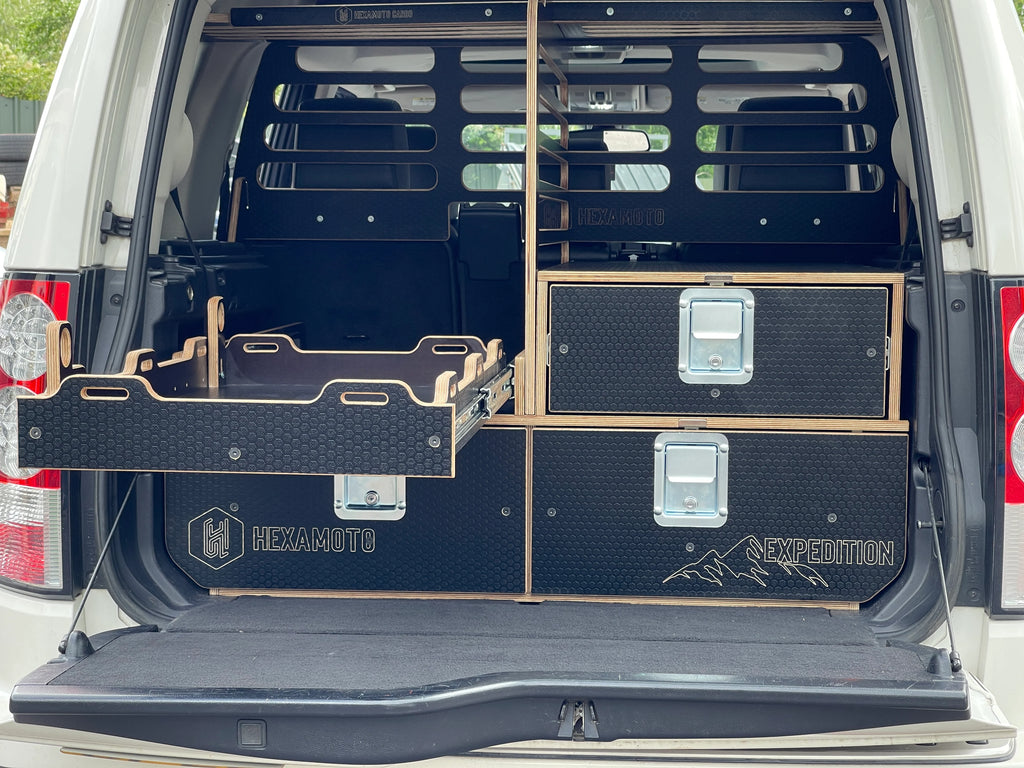 Land Rover Discovery 3 with storage system in the rear branded Hexamoto Expedition